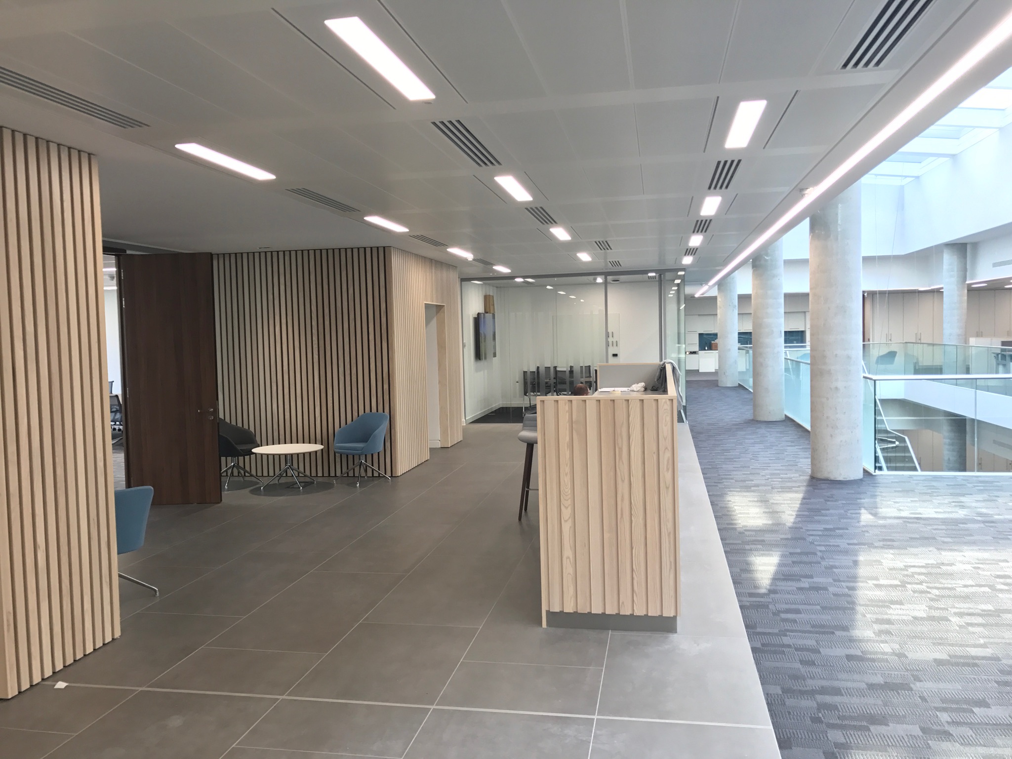Girl sitting in her tent with a coffee