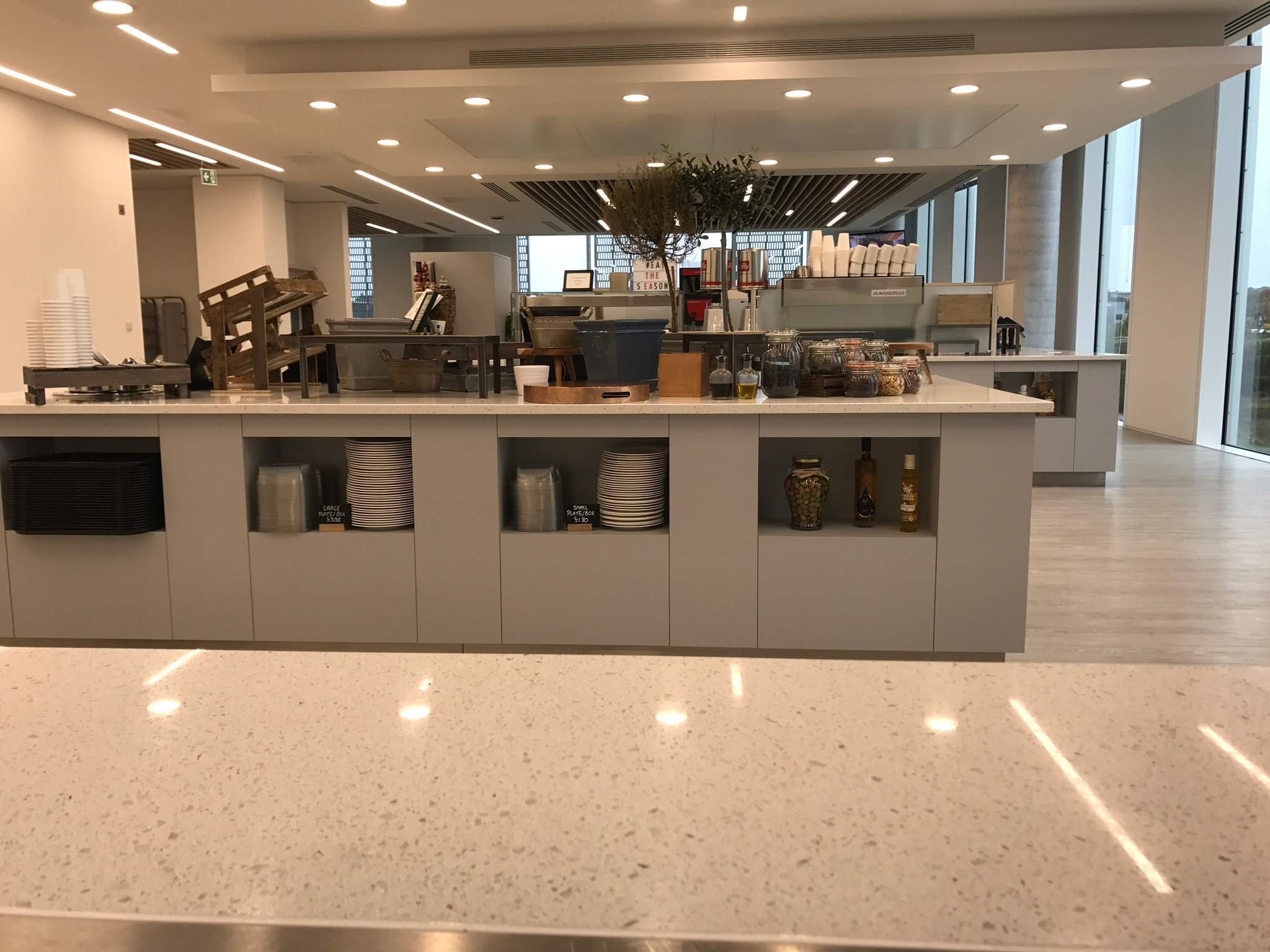 Girl sitting in her tent with a coffee