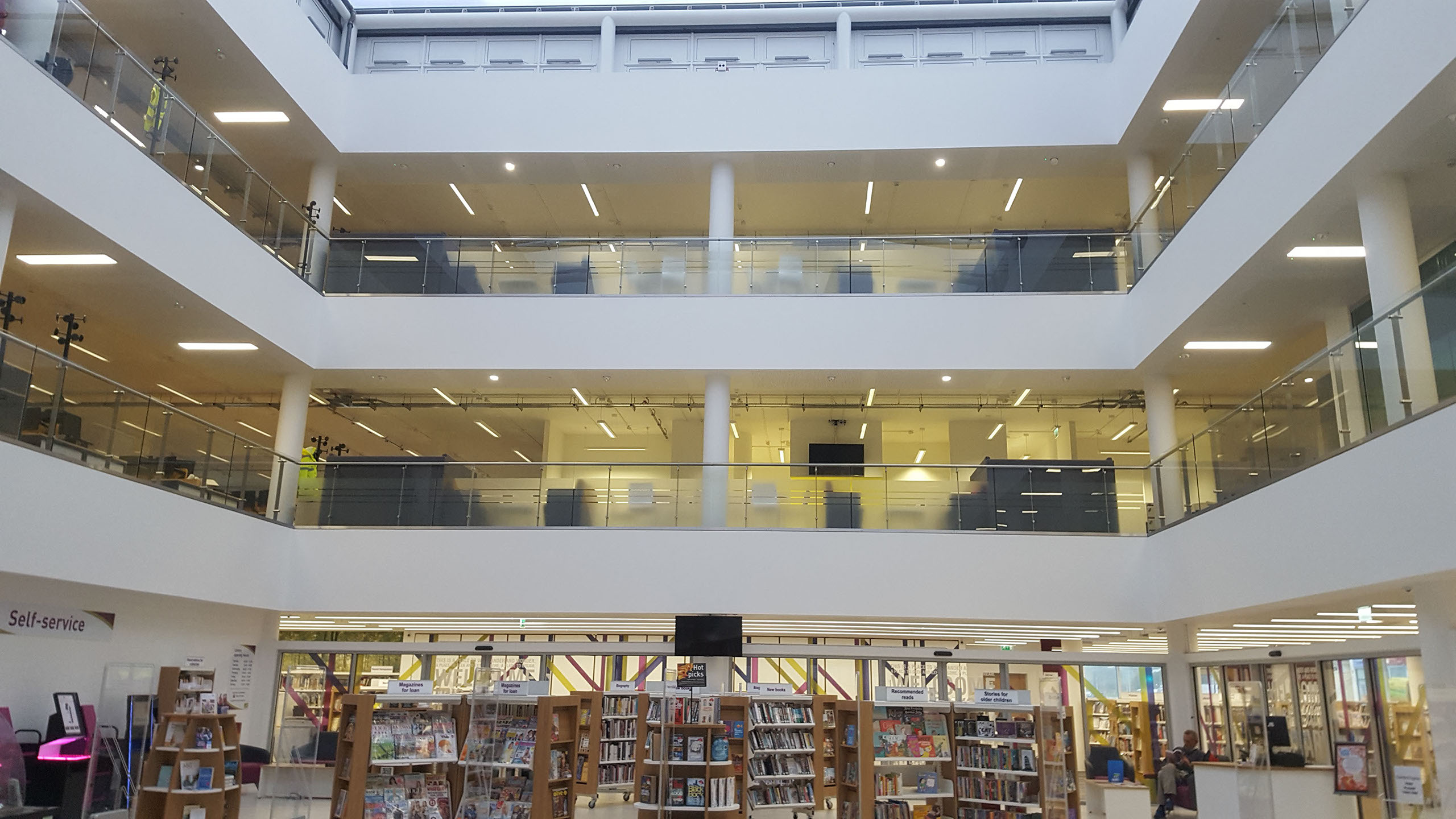 Girl sitting in her tent with a coffee