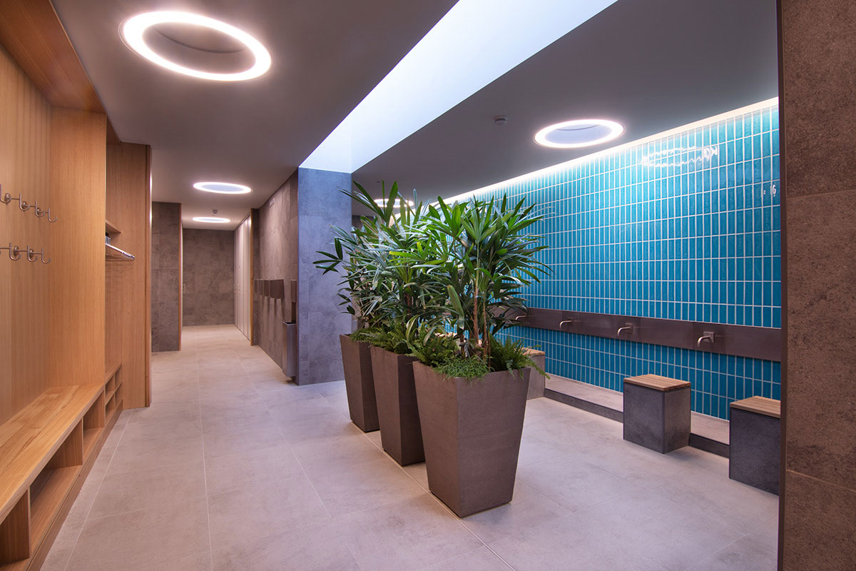 Girl sitting in her tent with a coffee