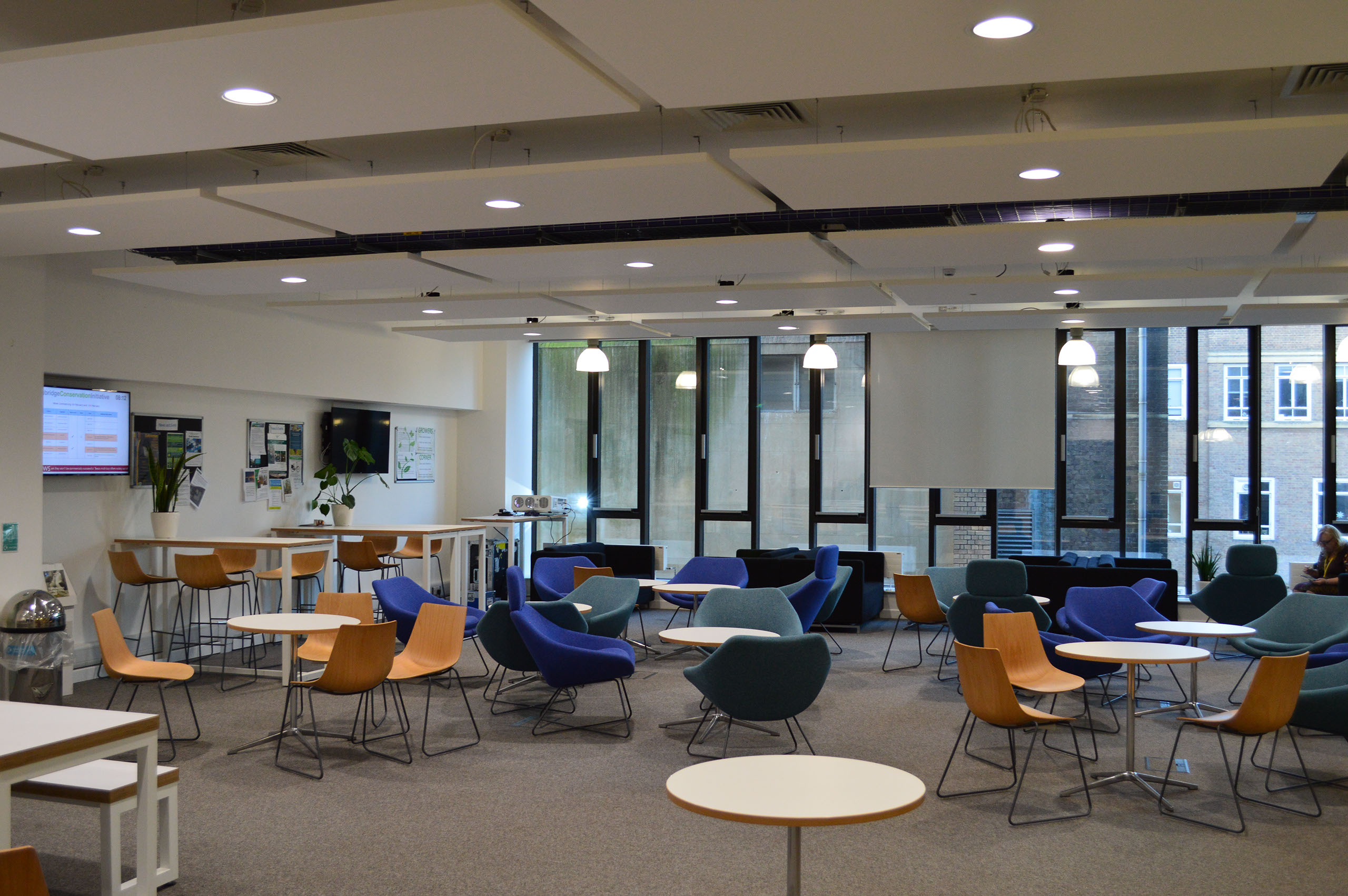 Girl sitting in her tent with a coffee