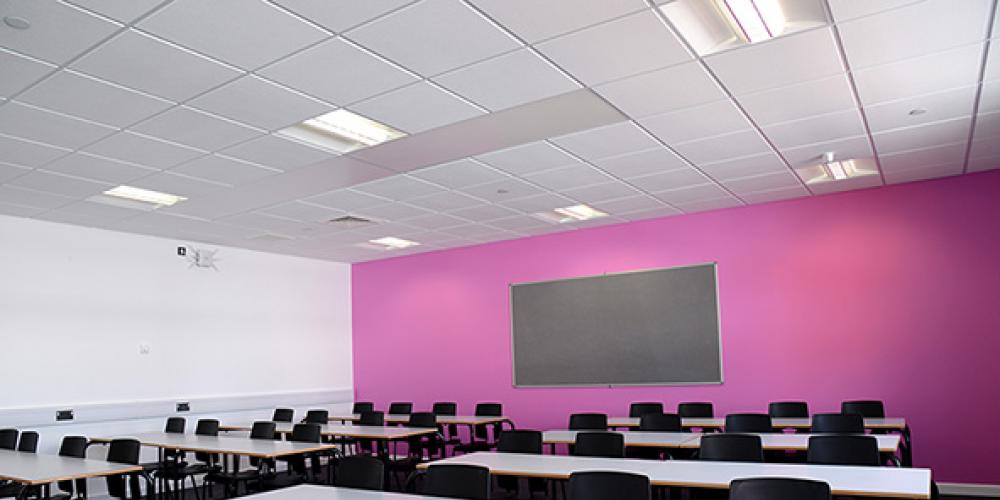 Girl sitting in her tent with a coffee