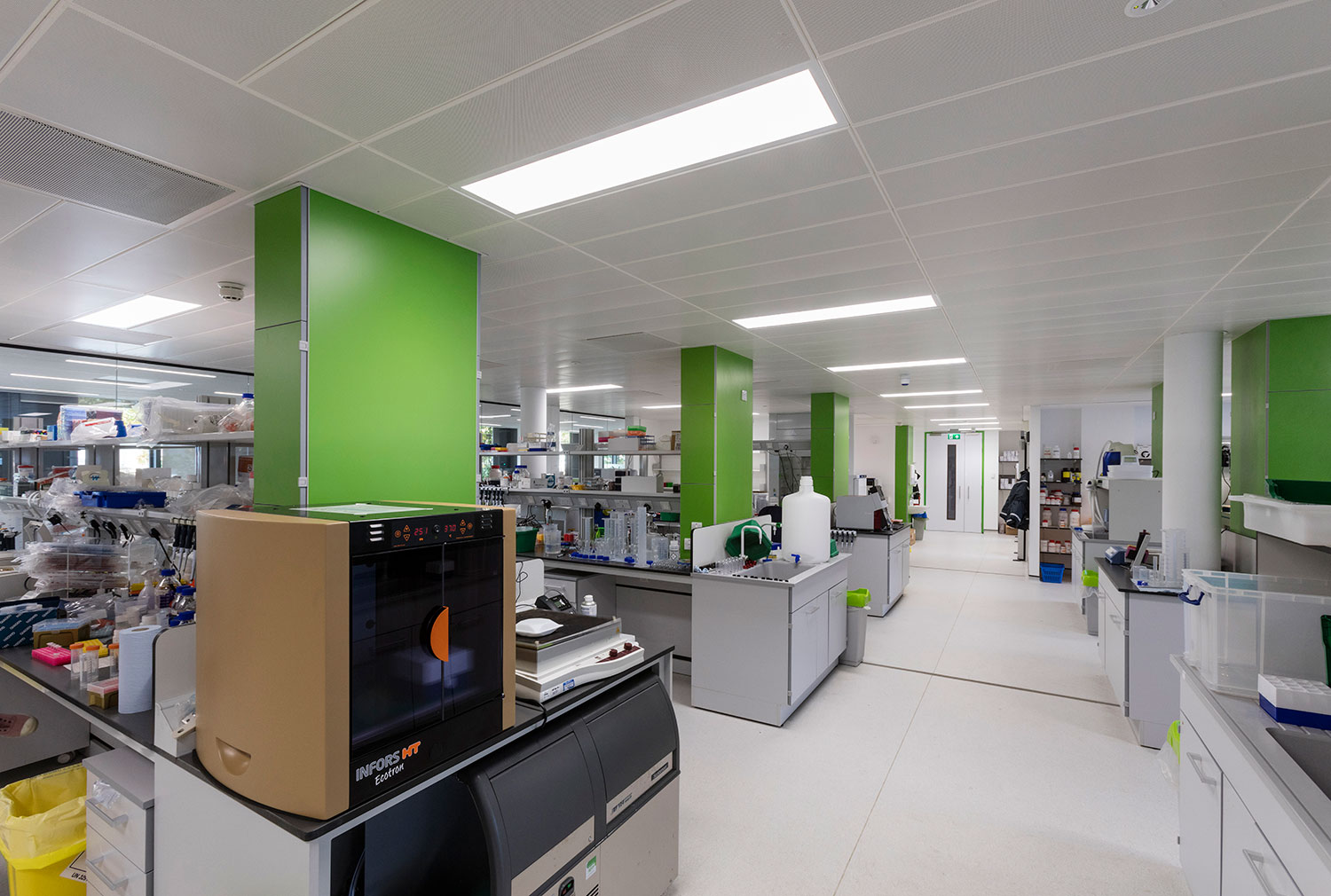 Girl sitting in her tent with a coffee
