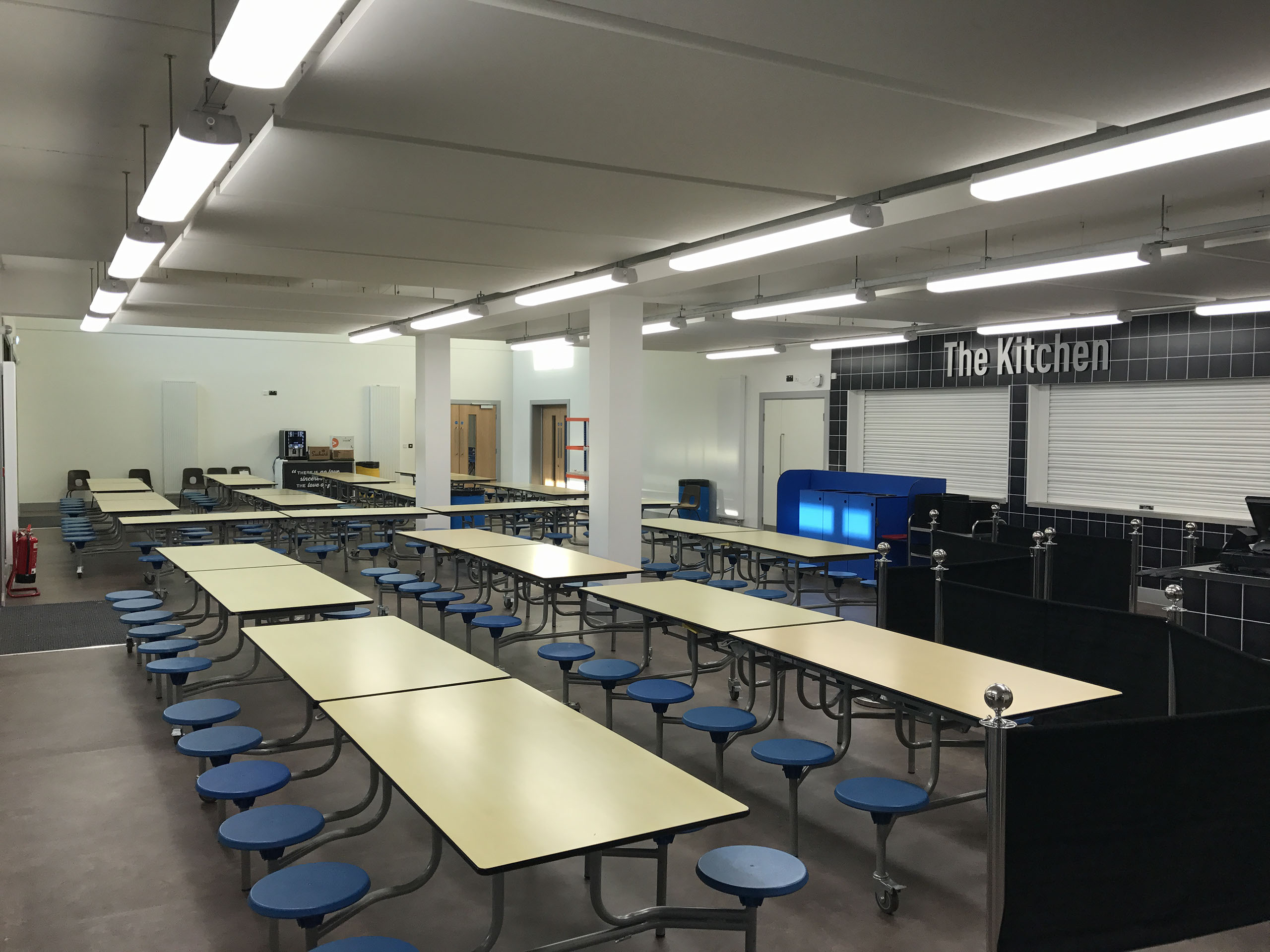 Girl sitting in her tent with a coffee