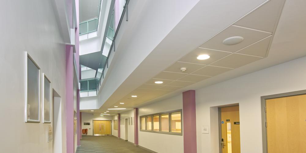 Girl sitting in her tent with a coffee